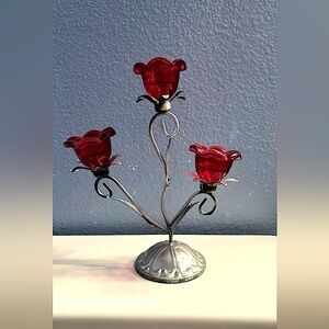 Metal and crystal candles handle with red roses